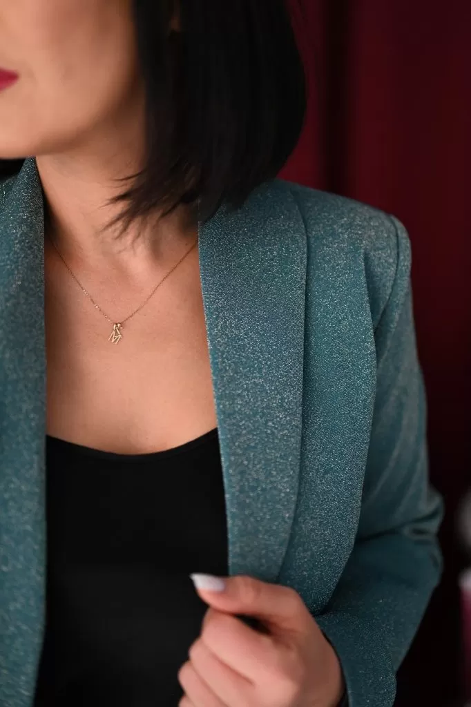 Zielony garnitur damski z brokatem