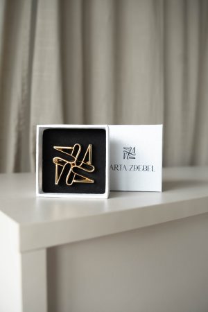 Złota broszka damska